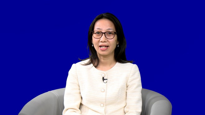 Nguyen Thi Lan Phuong explains that the FTA Index measures five groups of indicators. (Photo: Duc Duy/Vietnam+) FTA 3.jpg