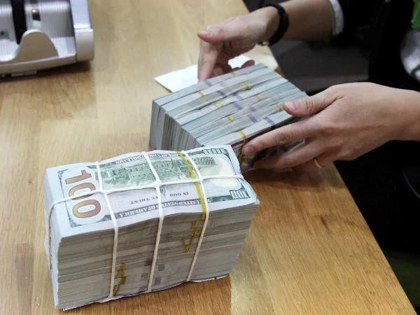 The VND/USD market rate had depreciated by 8% year-on-year as of the end of May 2024. (Photo: VietnamPlus) exchange rate.webp
