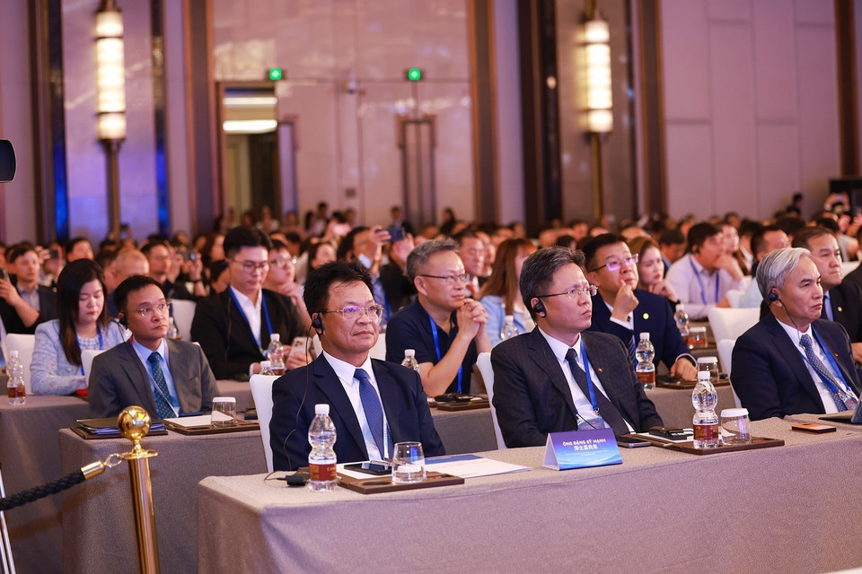 Delegates from Vietnam and China at the forum. (Photo: Duong Giang – VNA)