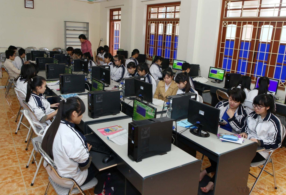 Information technology is applied mass-scale in teaching across the country and at all educational levels. (Photo: VNA)
