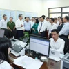 Party leader inspects two-tier local government operations in Hanoi