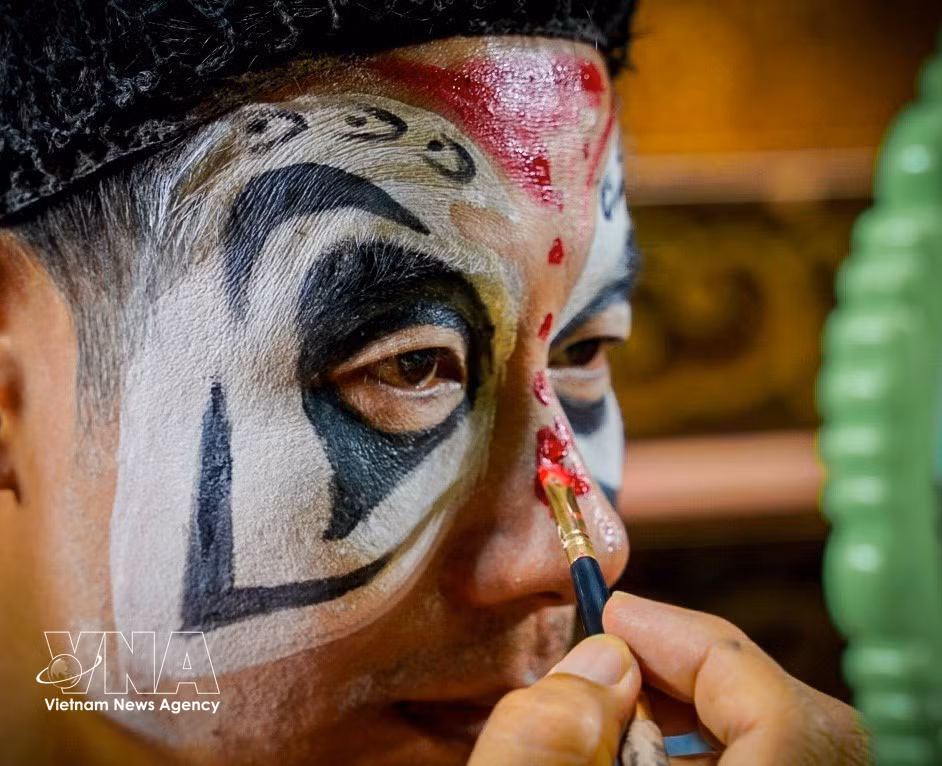 Make-up in Tuong is an intricate process, not merely for aesthetics but to depict a character’s personality, status and morality the moment they step onto the stage. (Photo: VNA)