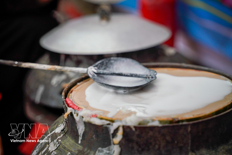 The rice must be carefully selected, soaked to the right level, finely ground, and then steamed over a cloth stretched across a pot. (Photo: VNA)