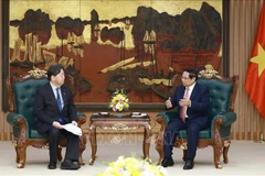 Prime Minister Pham Minh Chinh receives Japan’s Minister of Internal Affairs and Communications Hayashi Yoshimasa in Hanoi on January 15, 2026. Photo: VNA