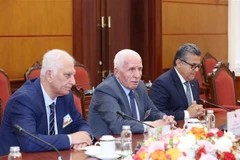 Secretary General of the Palestine Liberation Organisation (PLO) Azzam Najib Mustafa Al-Ahmad at the meeting. (Photo: VNA)