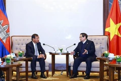 Prime Minister Pham Minh Chinh (R) receives Cambodian Deputy Prime Minister and Minister of Foreign Affairs and International Cooperation Prak Sokhonn in Hanoi on February 25, 2025 (Photo: VNA)