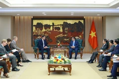 Prime Minister Pham Minh Chinh receives Swedish Ambassador to Vietnam Johan Ndisi and Dennis Nobelius, CEO of SYRE, in Hanoi on January 30, 2026. Photo: VNA
