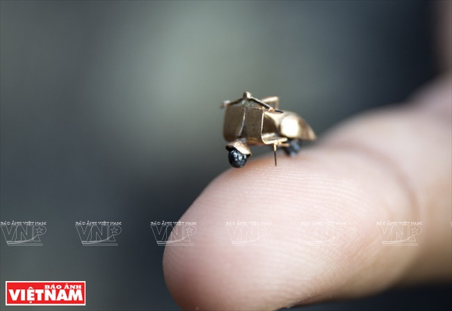 Miniature model of an old vespa (Photo: VNA)