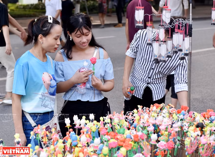  Colourful toy figurines attract youngsters (Photo: VNA)