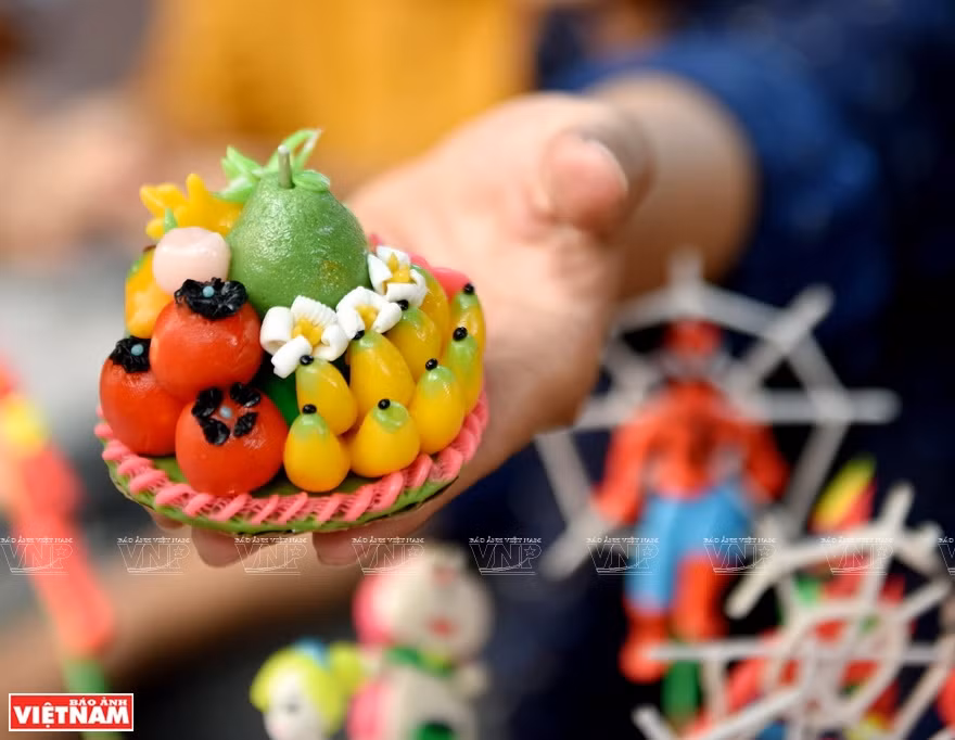 Toy figurines’ four basic colours are yellow, red, blue and black (Photo: VNA)