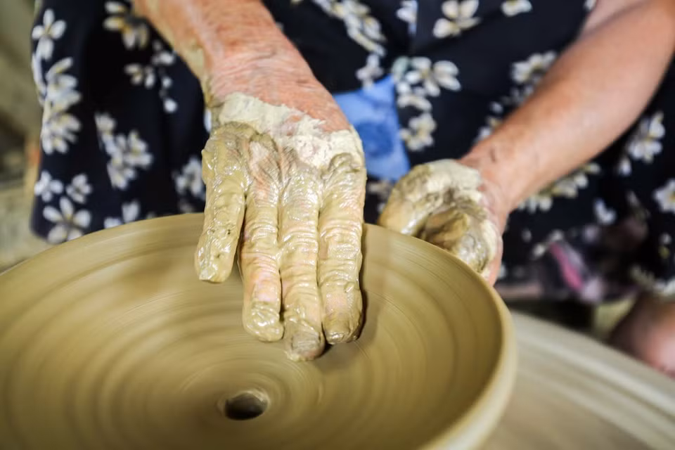 The locals use clay on the Thu Bon river to make pottery (Photo: Vietnam+)