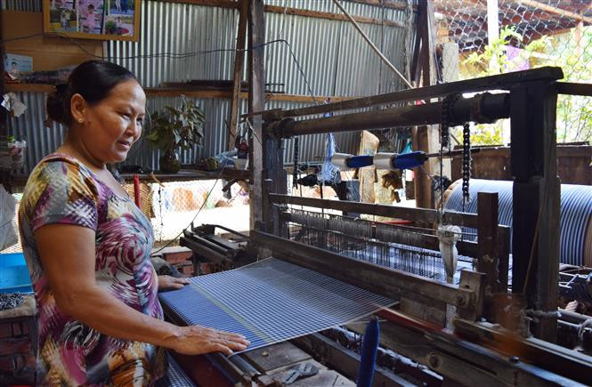 Given that, locals have thought twice to renovate their products (Photo: VNA)