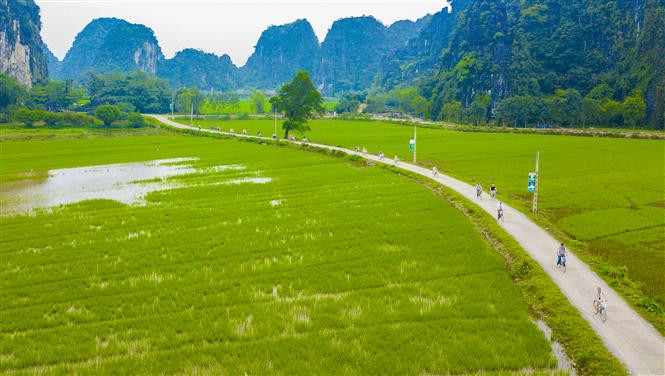 The site attracts tourists thanks to its green, clean and beautiful environment (Photo: VNA)