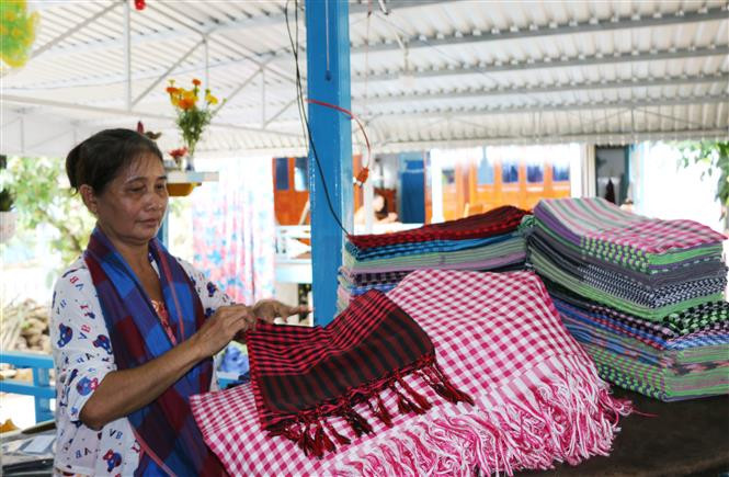 The trade village can now supply nearly 1.5 million scarfs annually (Photo: VNA)