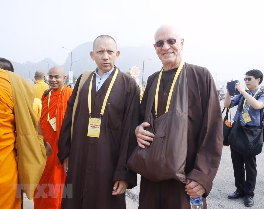 Monks, nuns and Buddhist followers before the opening ceremony of Vesak celebrations (Photo: VNA)