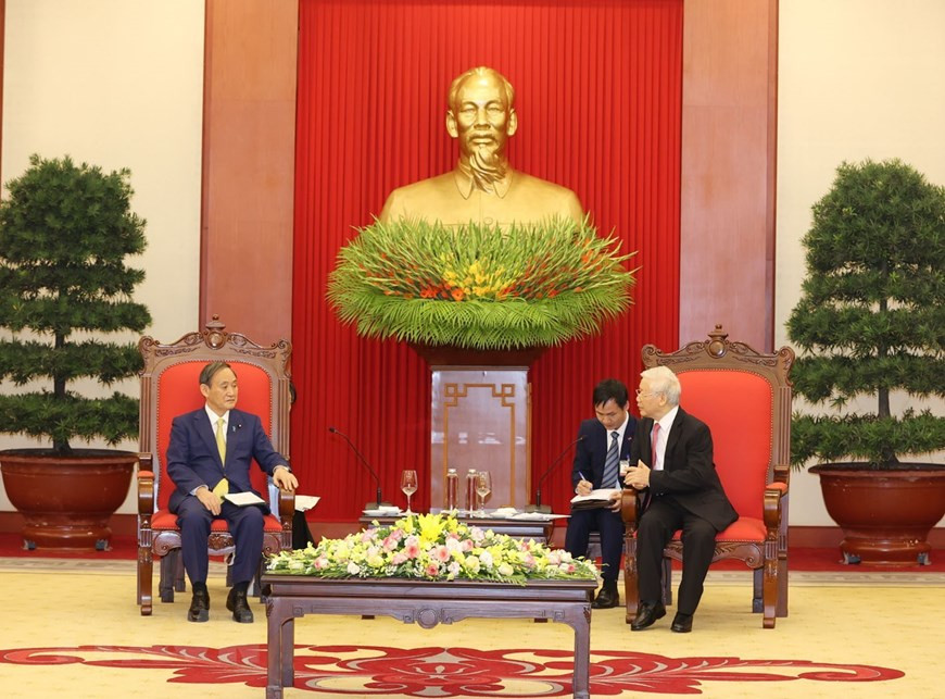 Party General Secretary and President Nguyen Phu Trong hosts a reception for Japanese Prime Minister Suga Yoshihide (Photo: VNA)
