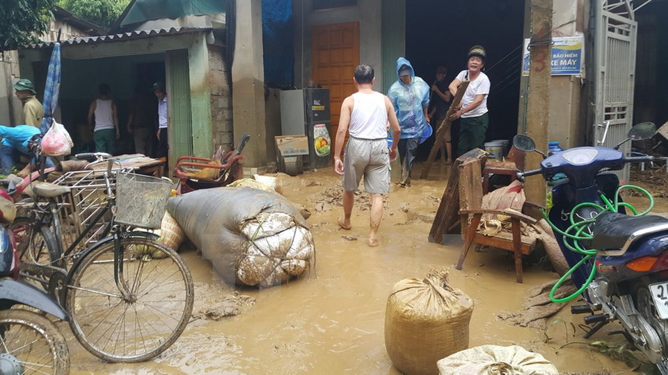 The flood causes many difficulties for local residents (Source: VNA)