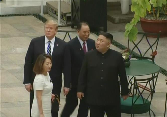 US President Donald Trump and DPRK Chairman Kim Jong Un take stroll around Metropole hotel (Photo: VNA)