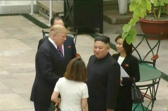  US President Donald Trump and DPRK Chairman Kim Jong Un take stroll around Metropole hotel (Photo: VNA)