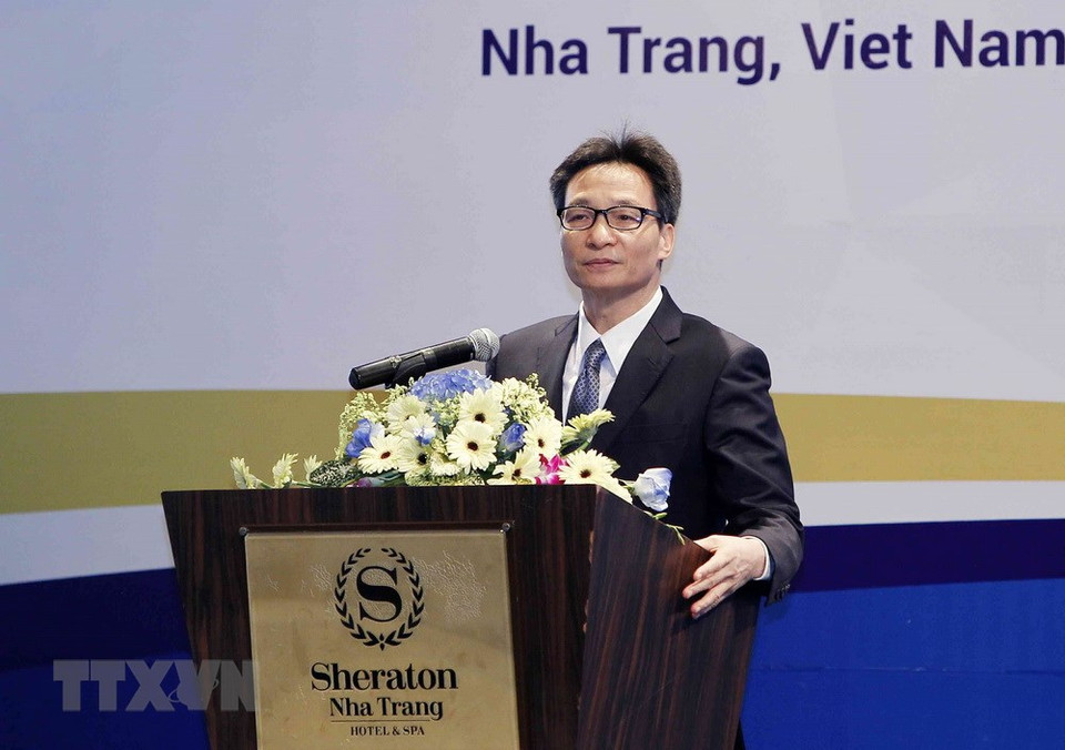 Deputy Prime Minister Vu Duc Dam delivers a speech at the event (Photo: VNA)