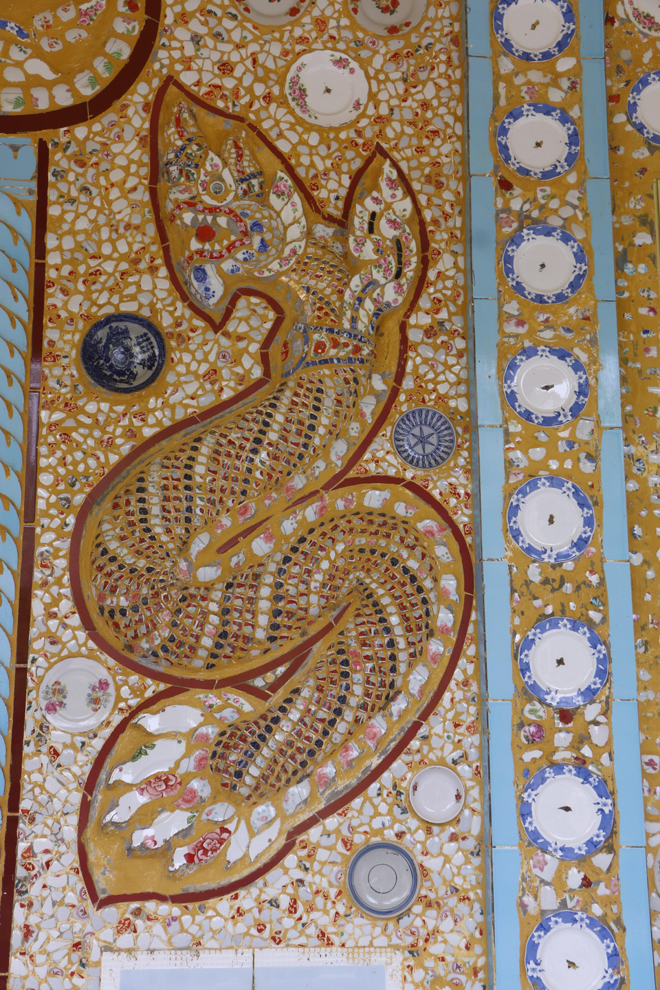 The pagoda's walls are decorated with plates. (Photo: VNA)