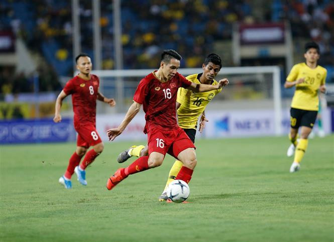 Centre-back Do Hung Dung (16) in action (Photo:VNA)