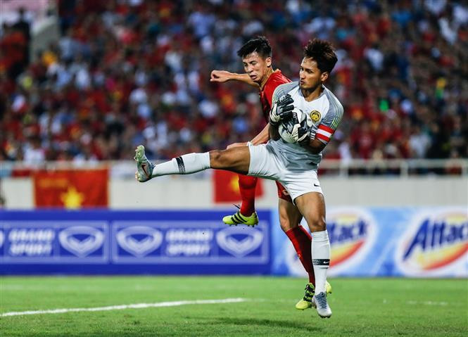 Defender Bui Tien Dung (4) (Photo: VNA)