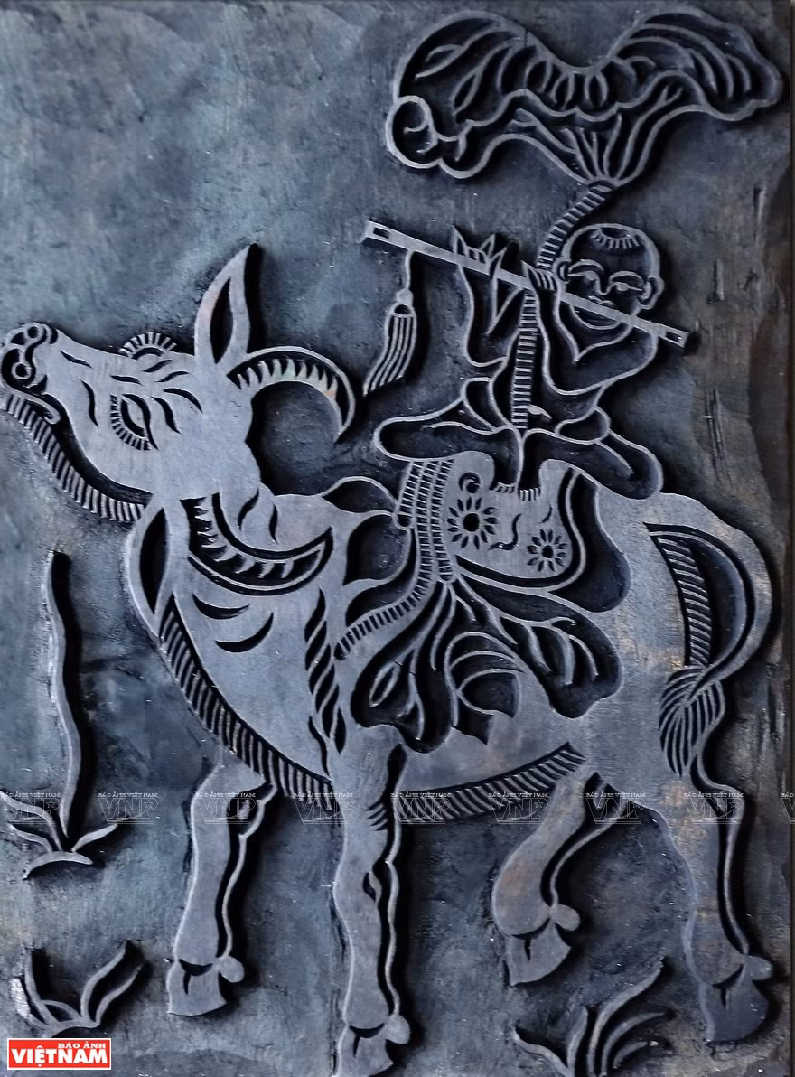 The woodcut of the painting 'Boy Sitting on a Buffalo and Playing the Flute' (Photo:VNA/VNP)