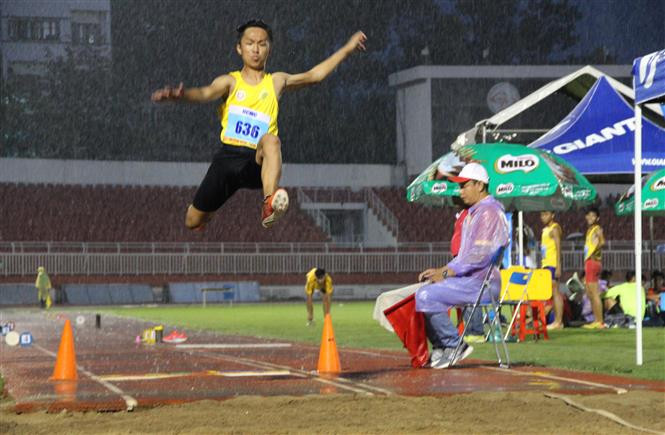 Athletes compete in the men’s long jump final (Photo: VNA)
