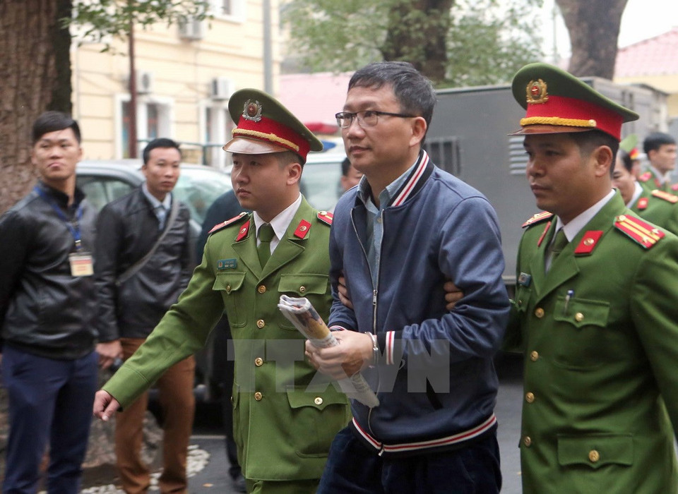 Trinh Xuan Thanh, former Chairman and General Director of PVC, was led to the court. (Source: VNA)