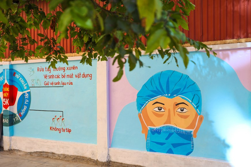 The mural paintings encourage people to adhere to anti-pandemic recommendations by the Health Ministry. (Photo: Vietnam+)