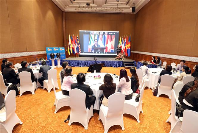 Launching ceremony for the Regional Report 'Promote Sustainable Integration of ASEAN Community through ensuring the legal status of ASEAN women and children.' (Photo: VNA)