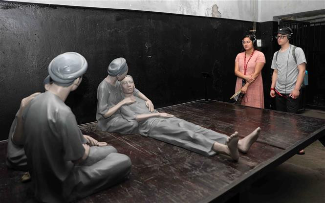 Hoa Lo prison in Hanoi comprises of tiny, damp and dark cells that evoke eerie claustrophobia, which would be multiplied by the use of manacles and the presence of rats (Photo: VNA)