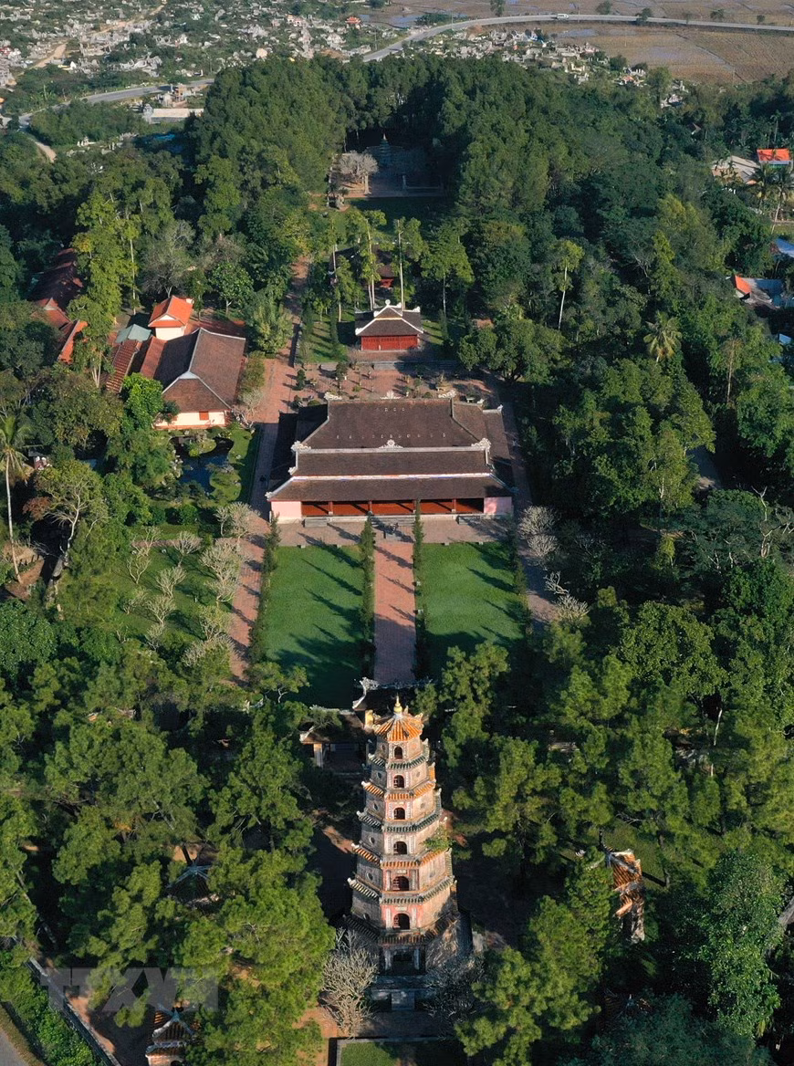 Seen from above, it resembles a giant turtle extending its shadow onto the Huong river (Photo: VNA)