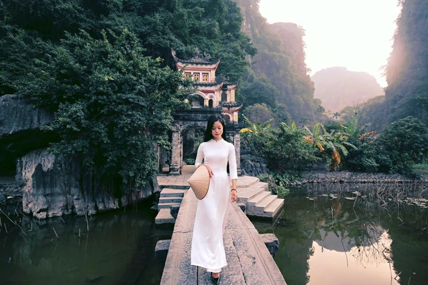 Far too few travellers make it to Ninh Binh, a mesmerising area known locally as “Ha Long bay on land” thanks to its magical riverine landscape, with sheer limestone mountains that rise up from the paddies. Just two hours from Hanoi, Ninh Binh is one of Vietnam’s most striking destinations. The best way to get a sense of this UNESCO-protected site is by taking a paddleboat tour along its shimmering rivers, and climbing to the top of its fabled peaks. Breathtaking boat rides and lush countryside are just half of the appeal: the area is also rich in cultural treasures and is listed as a UNESCO Heritage Site. The temperatures in Ninh Binh are ideal from March to May and September to November. (Photo: Vietnamplus)