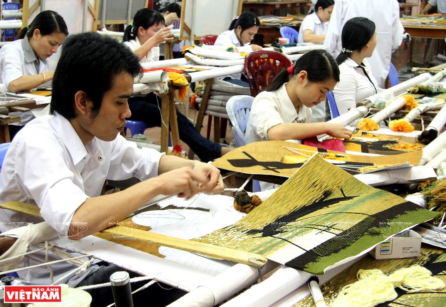 Quat Dong embroidery village attracts people from other localities to study the trade (Photo: VNA)