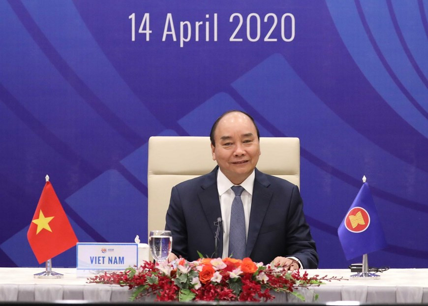 Prime Minister Nguyen Xuan Phuc, Chairman of ASEAN 2020, delivers a speech at the opening ceremony of Special ASEAN Summit on COVID-19 (Photo: VNA)