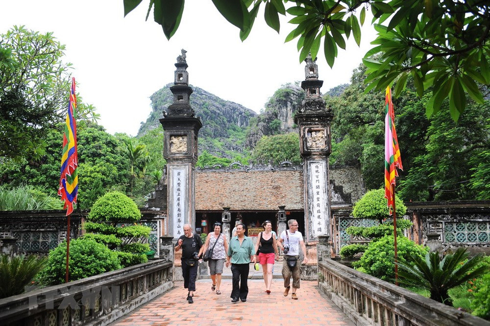 Tourists at the Dinh Tien Hoang King's Temple, a special spiritual, architecture and cultural site. (Photo: VNA)