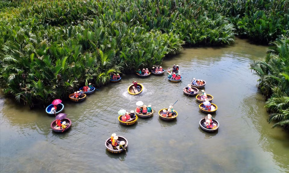 Exploring the Bay Mau coconut forest and gliding through its waters on basket boats is an absolute must for any visitor to Hoi An. Located approximately 3 kilometres from the ancient town, the experience promises unforgettable memories. (Photo: VNP/VNA)