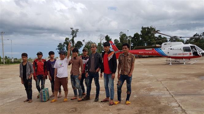 Hoang Anh Gia Lai workers safely return from the flooded site (Photo: VNA)