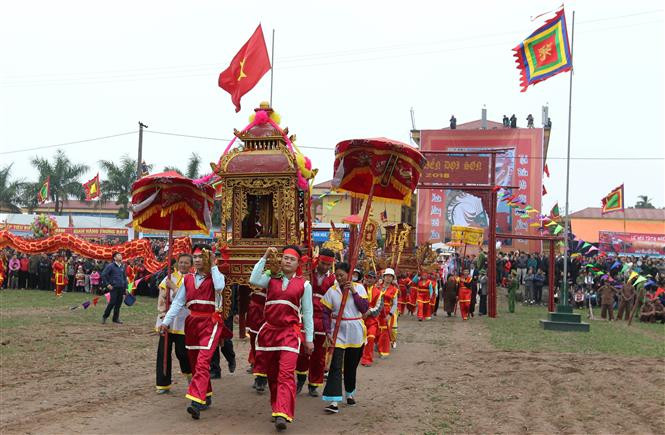 Traditional procession at the festival (Photo: VNA)