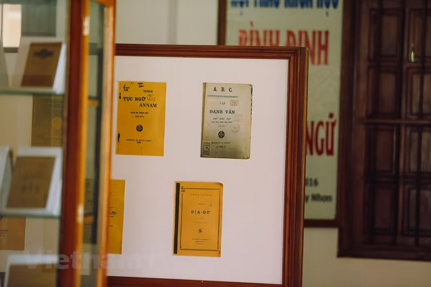 First copies of Quoc Ngu, Vietnamese writing system based on the Roman alphabet, are displayed at the church (Photo: Minh Son/ Vietnamplus)