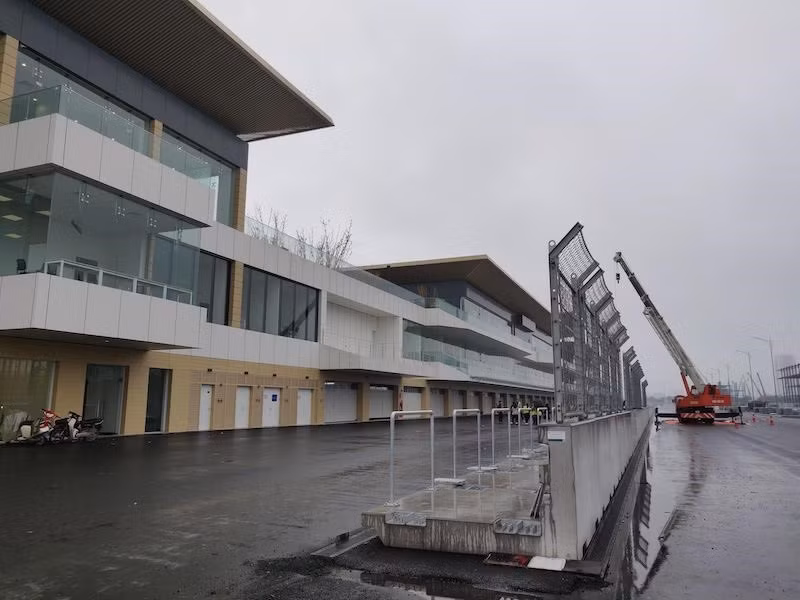 Work on the Hanoi Circuit itself - which runs to 5,607m in length and features 23 corners - continues and is expected to near majority completion by the end of this month. A unique hybrid design, fusing a street circuit’s characteristics with a permanent track layout, the track is the first of its kind to be developed in partnership by Tilke Engineers and the race’s own Motorsports Division and is set to become one of the most challenging and exciting circuits in the sport. The workers and machines are working with the highest efforts to hand over the project in time. (Photo: Reporter/Vietnam+)