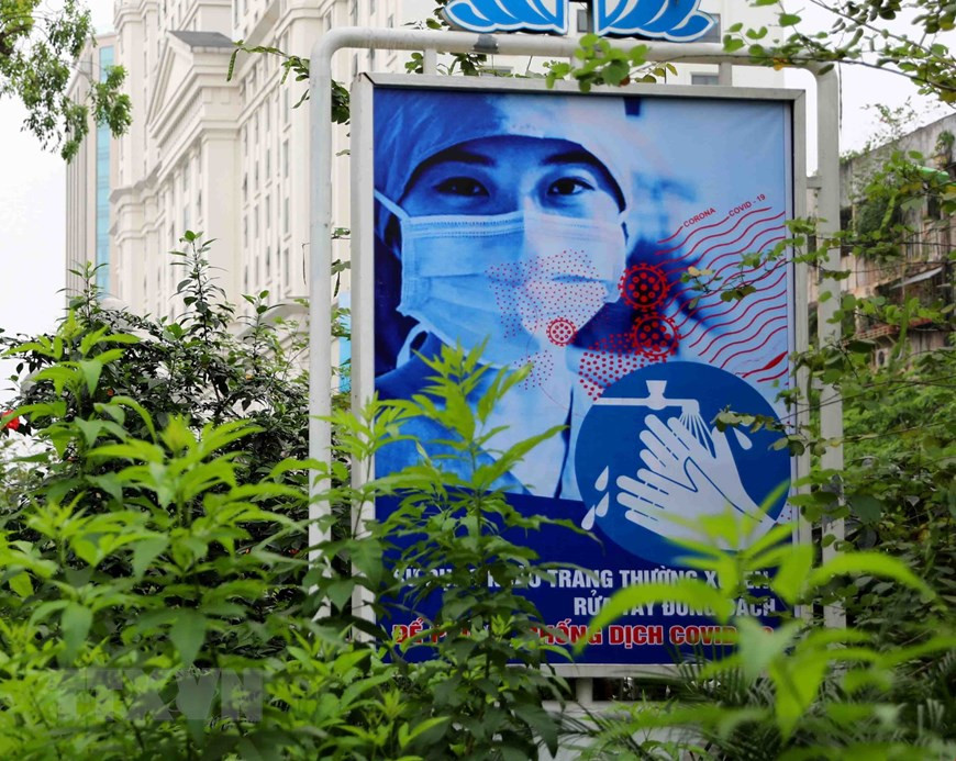 A poster on Giang Vo street in downtown Hanoi (Photo: VNA)