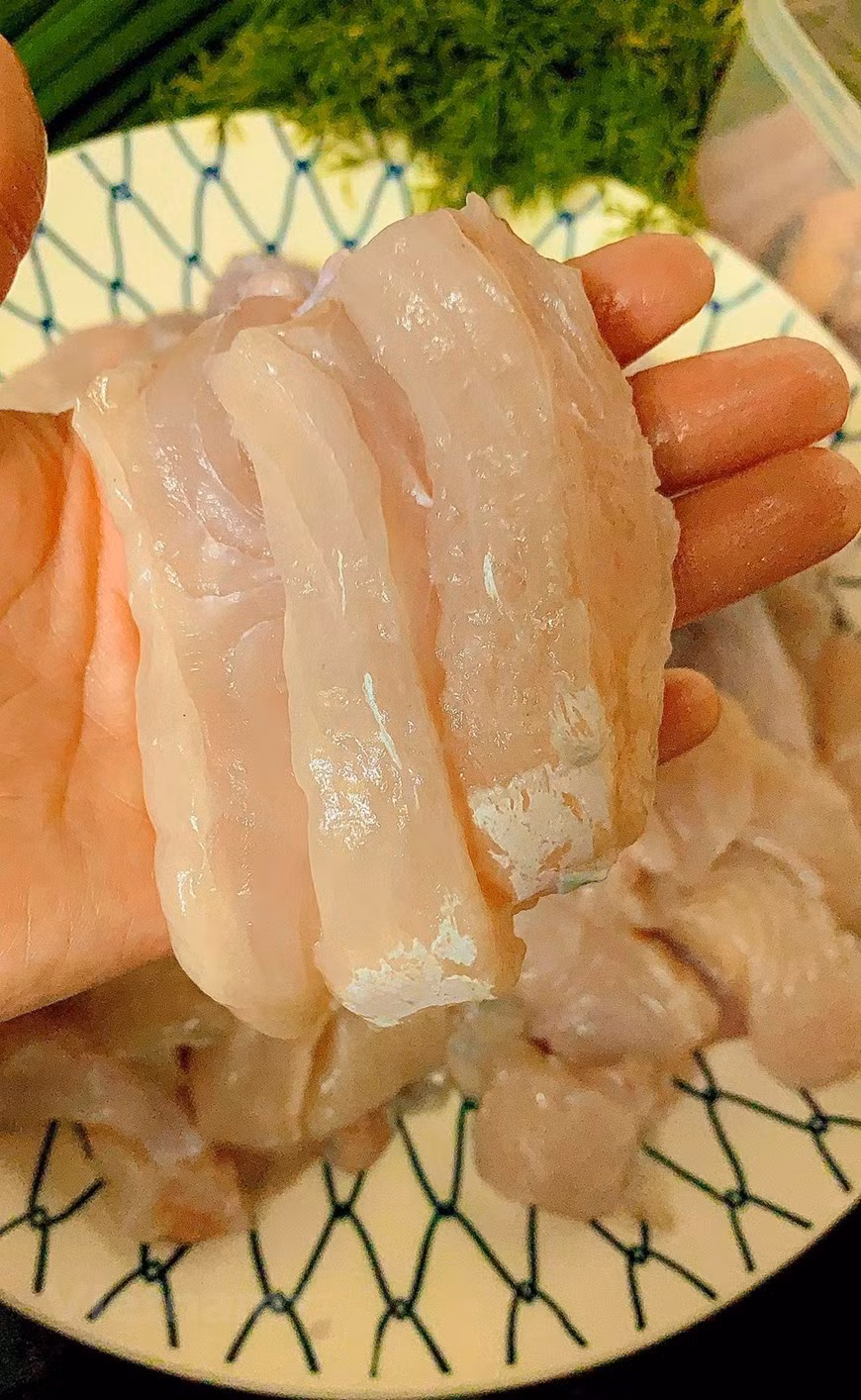Prepare fish: - Debone the fish - Cut into pieces (Photo: Dau Dau/Vietnam+)