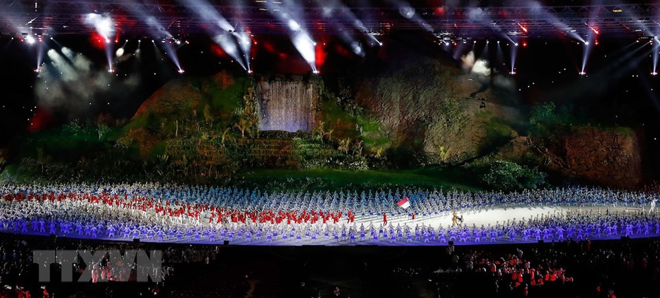 Delegations march at the ceremony (Photo: Xinhua/VNA)