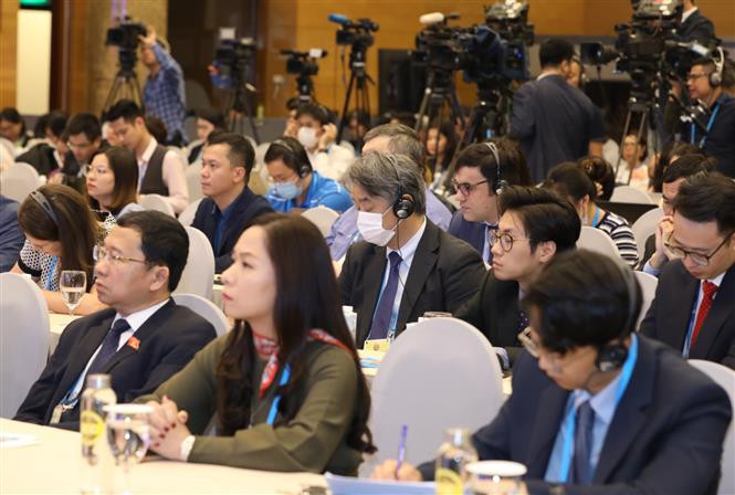 Domestic and international reporters at the press conference (Photo: VNA)