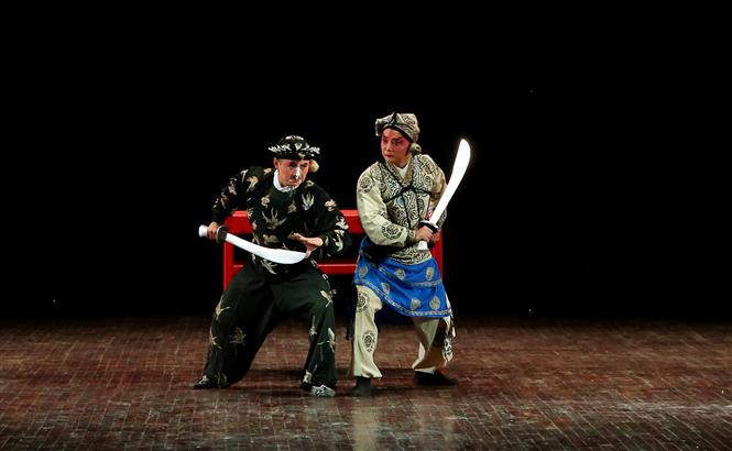 A Chinese theatrical performance at the event (Photo: VNA) 