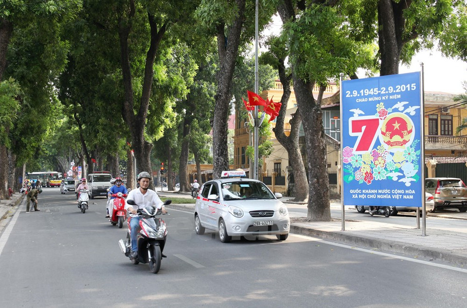 On these days, streets are adorned with colourful banners, flags and posters. (Photo: VNA)
