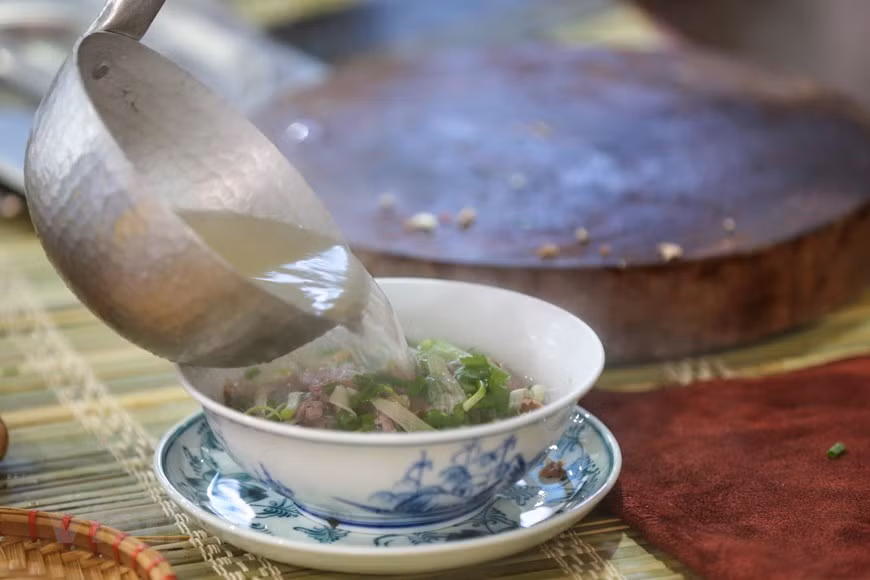 Lots of journalists go for bowls of ‘Pho’ (Photo: VNA)